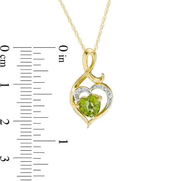 Goldia Necklaces 60mm HeartShaped Peridot and Natural Diamond Accent Swirl Heart Pendant in 10K Yellow Gold Goldia Necklaces 60mm HeartShaped Peridot and Natural Diamond Accent Swirl Heart Pendant in 10K Yellow Gold