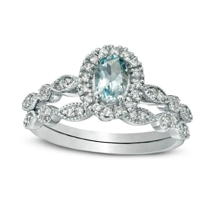 Goldia Rings Oval Aquamarine and 020 CT TW Natural Diamond Frame Antique VintageStyle Bridal Engagement Ring Set in Solid 10K White Gold Goldia Rings Oval Aquamarine and 020 CT TW Natural Diamond Frame Antique VintageStyle Bridal Engagement Ring Set in Solid 10K White Gold
