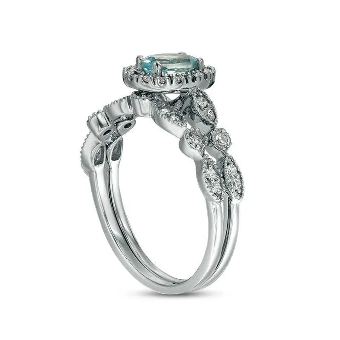 Goldia Rings Oval Aquamarine and 020 CT TW Natural Diamond Frame Antique VintageStyle Bridal Engagement Ring Set in Solid 10K White Gold Goldia Rings Oval Aquamarine and 020 CT TW Natural Diamond Frame Antique VintageStyle Bridal Engagement Ring Set in Solid 10K White Gold