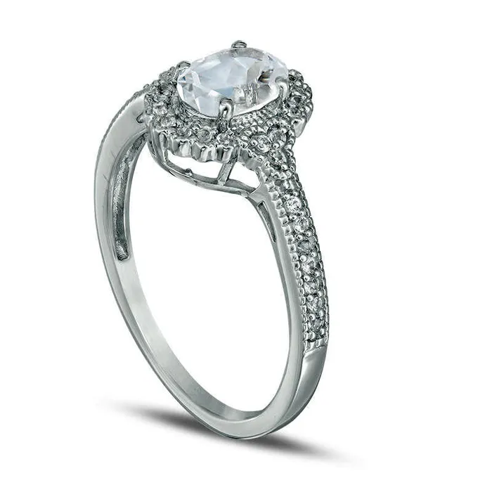 Oval LabCreated White Sapphire and 013 CT TW Diamond Frame Antique VintageStyle Ring in Solid 10K White Gold Goldia Rings Oval LabCreated White Sapphire and 013 CT TW Diamond Frame Antique VintageStyle Ring in Solid 10K White Gold Goldia Rings