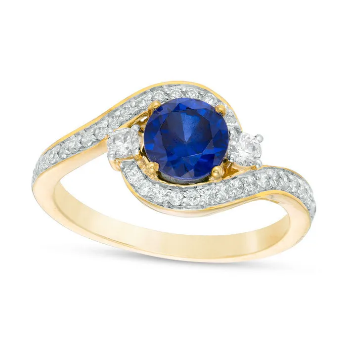 Rings 60mm LabCreated Blue Sapphire and 025 CT TW Diamond Three Stone Bypass Ring in Solid 10K Yellow Gold Goldia Rings 60mm LabCreated Blue Sapphire and 025 CT TW Diamond Three Stone Bypass Ring in Solid 10K Yellow Gold Goldia