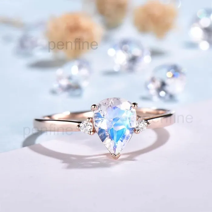 PENFINE Three Stone Rainbow Pear Shaped Moonstone Engagement Ring Elle Rose Gold Rings